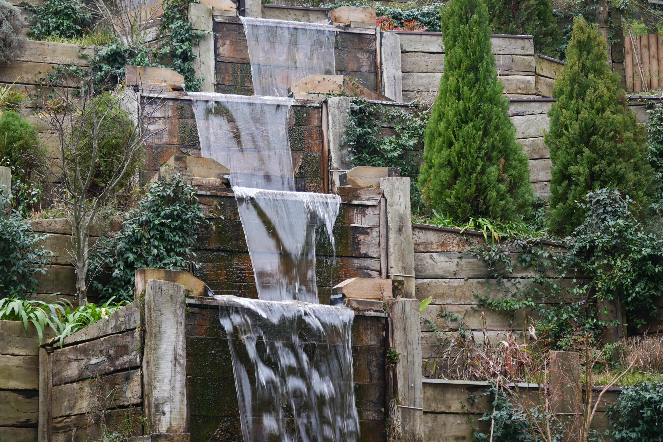 Decorative waterfall flowing from high.